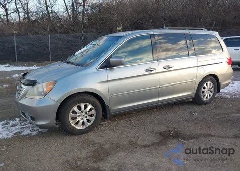 2010 Honda Odyssey Ex z USA, uszkodzony, nr VIN 5FNRL3H47AB097384